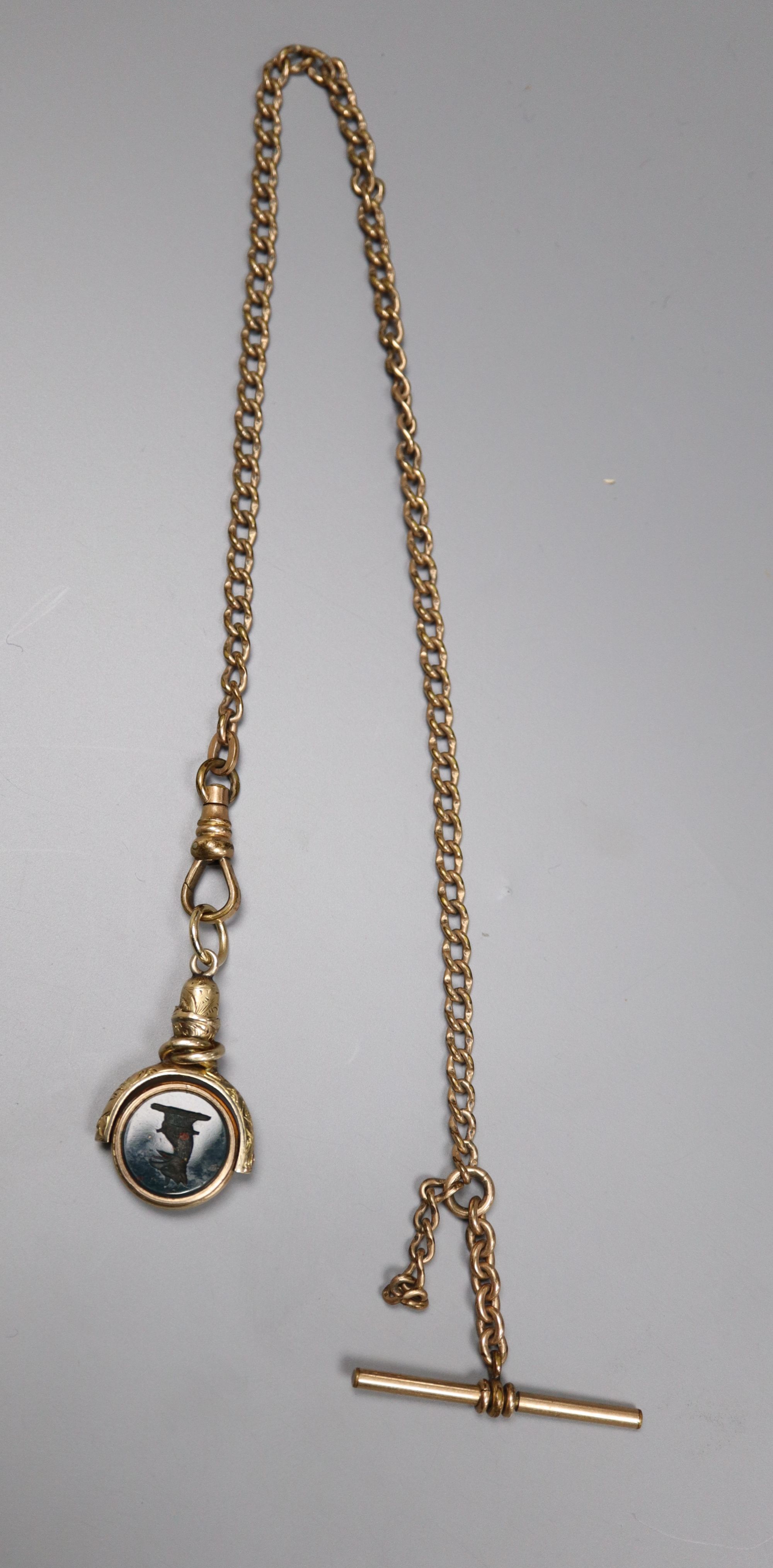 A Victorian yellow metal overlaid, sardonyx and bloodstone set swivelling fob, 30mm, on a gilt metal chain.